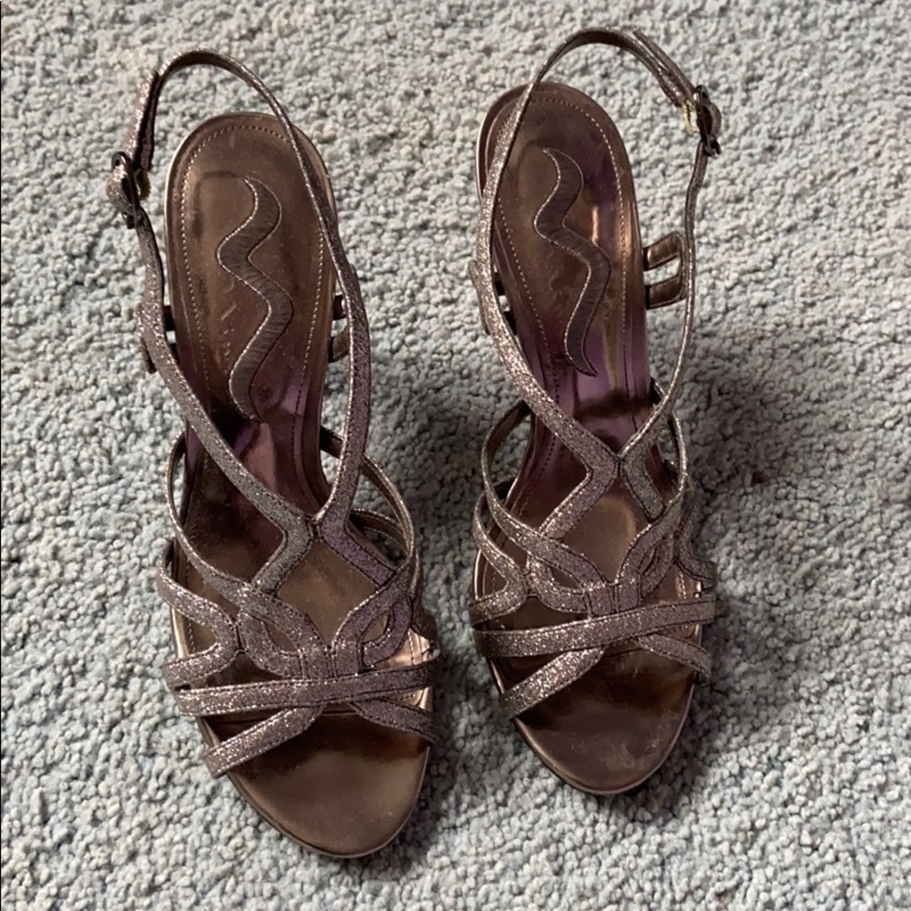Worn twice sparkly silver heels!